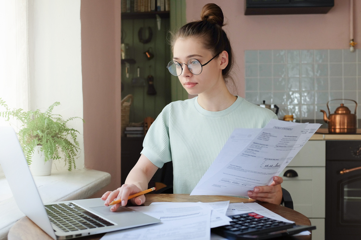 Woman Reading Electricity Bill